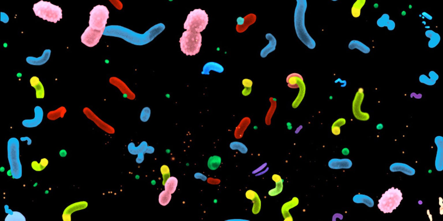 Een groep microben die door de lucht vliegen.