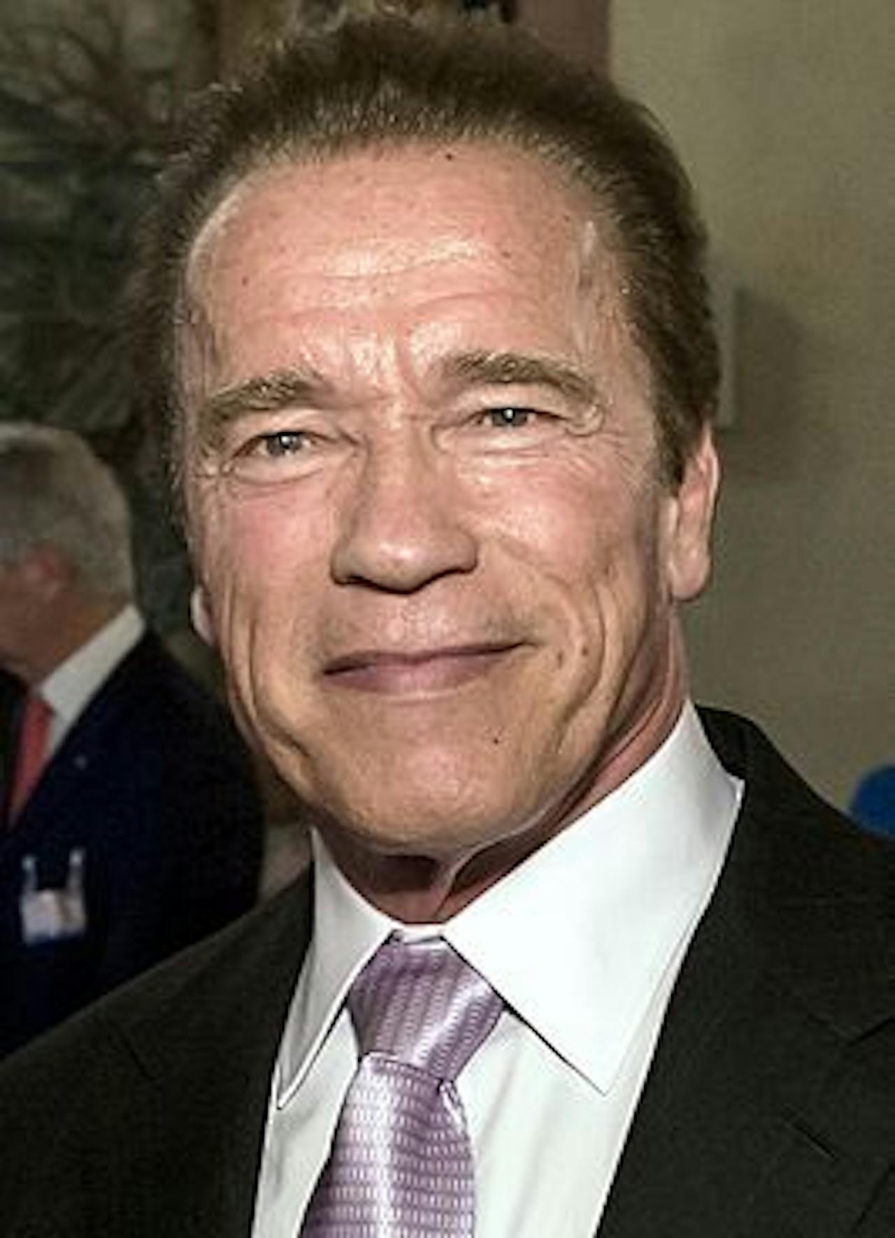 Een kleurenfoto van Arnold Schwarzenegger.