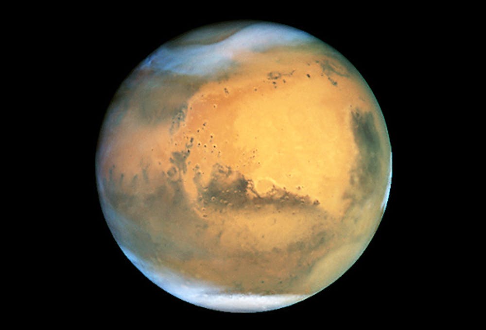 <p>Mars, gezien door door Hubble ruimtetelescoop</p>