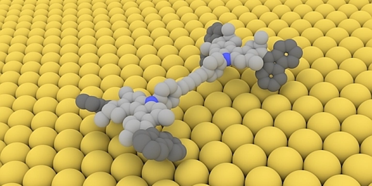 Een 3D-afbeelding van een molecuul omringd door gele ballen.