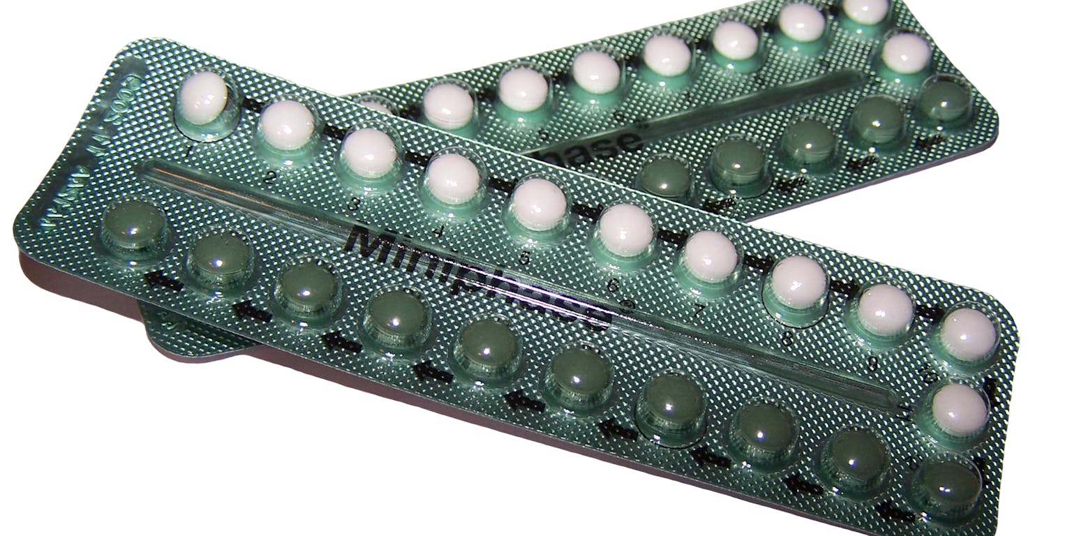 Twee strips van anticonceptiepillen. In het midden van de strip staat de tekst Miniphase.