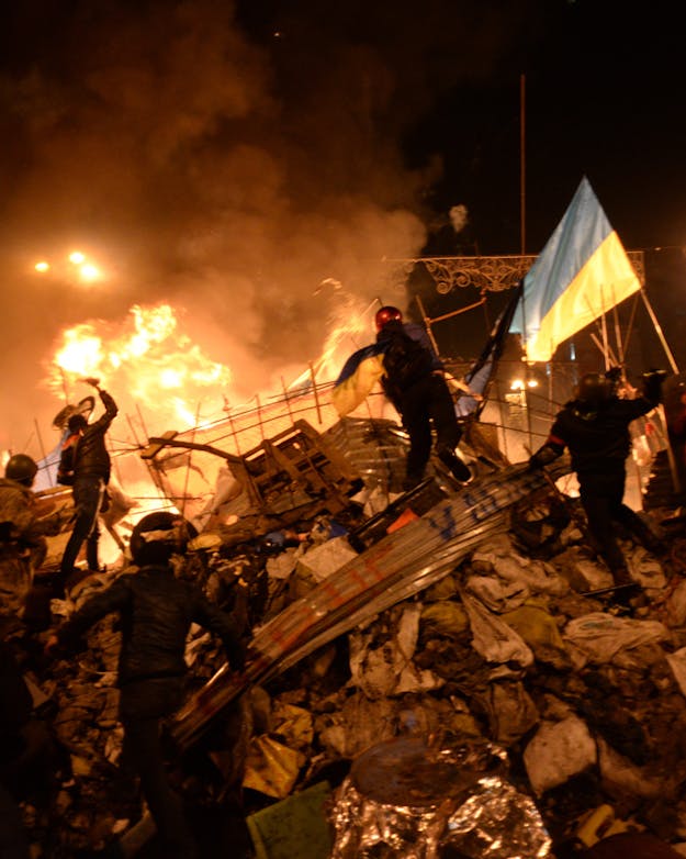 Demonstranten vechten tegen regeringstroepen op Majdan Nezalezjnosti in Kiev op 18 februari 2014. Demonstranten vechten tegen regeringstroepen op Majdan Nezalezjnosti in Kiev op 18 februari 2014.