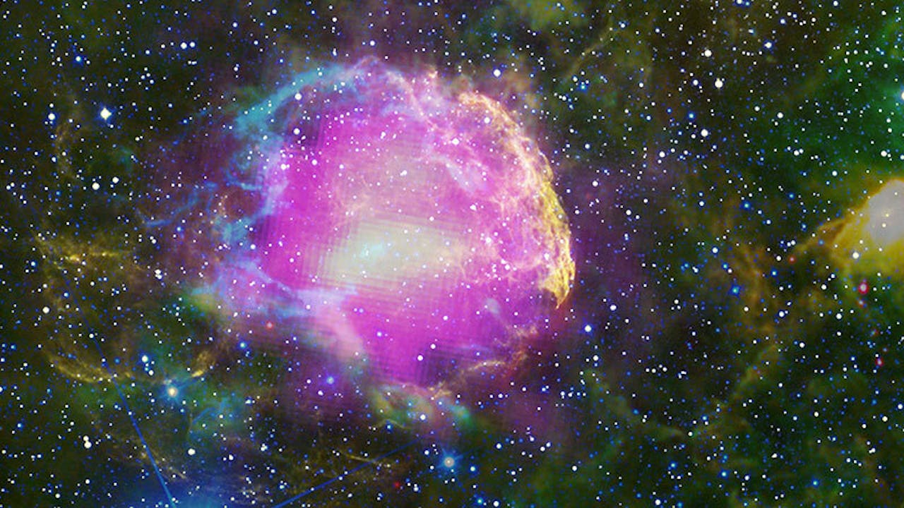 Samengestelde afbeelding van de resten van supernova IC 443. In zichtbare (geel) en infrarode golflengtes (blauw, cyaan, groen en rood) is de schokgolf te zien. In magenta is gammastraling te zien. Een afbeelding van supernova. Het verschijnsel waarbij een ster op spectaculaire wijze explodeert.