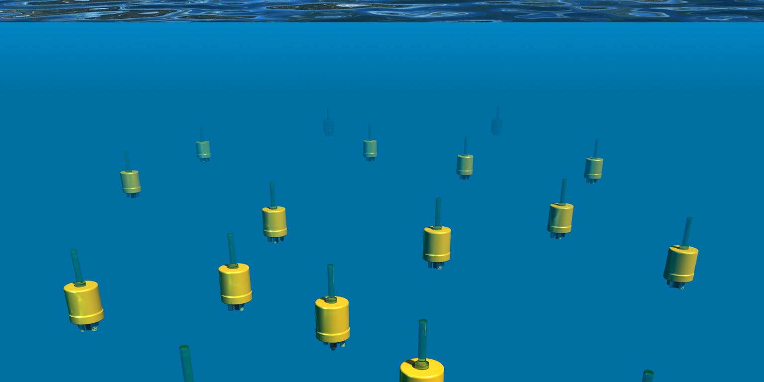 Planktonrobots zweven door het water.