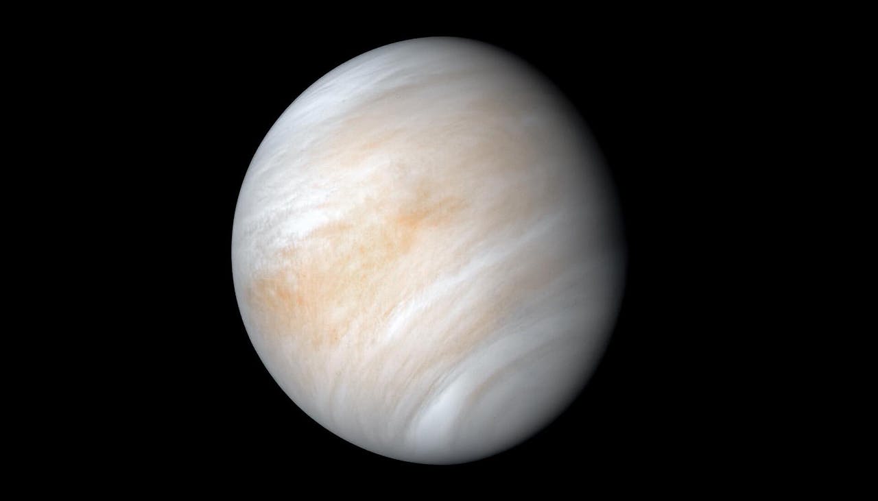 Een afbeelding van Venus op een zwarte achtergrond.