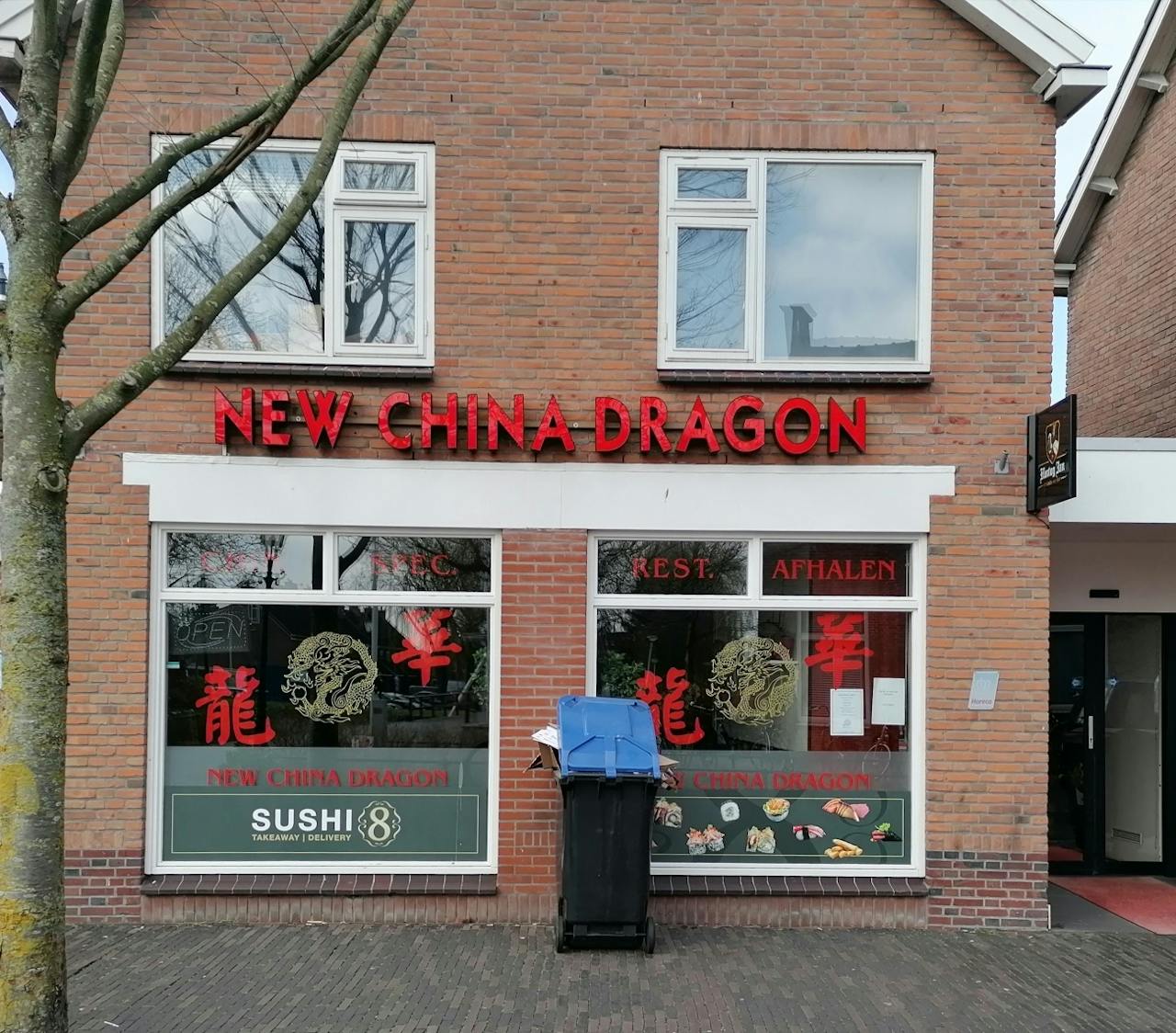 Een straatfoto van restaurant New China Dragon.