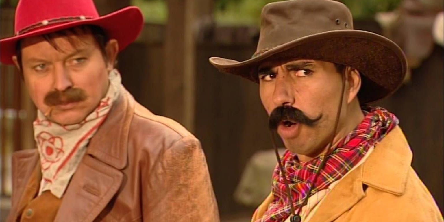 Twee mannen met cowboyhoeden en snorren.