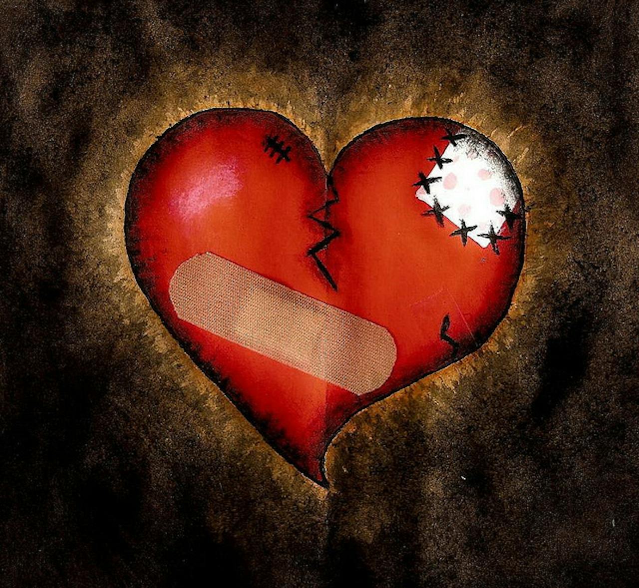 Een 'gebroken hart': een tekening van een hart met twee pleisters erop.