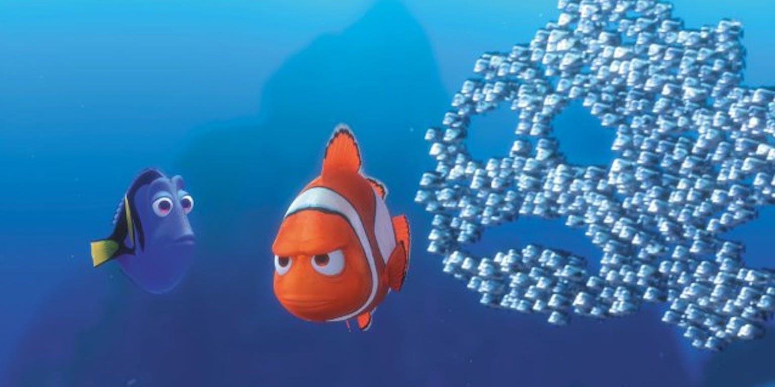 Nemo en Dory en een schaduw aan vissen op een blauwe achtergrond.