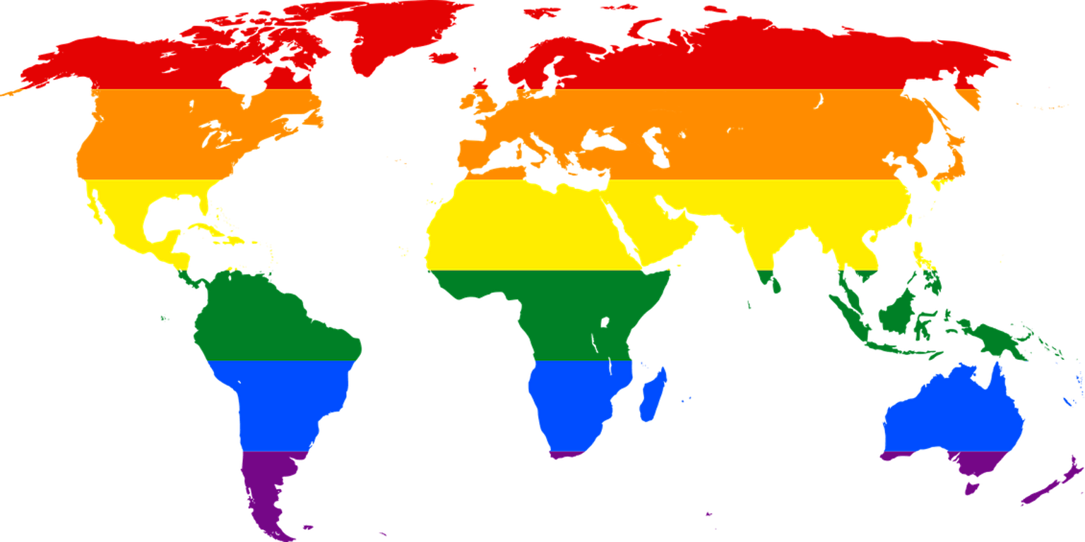 Een wereldkaart met een regenboogvlag erop.