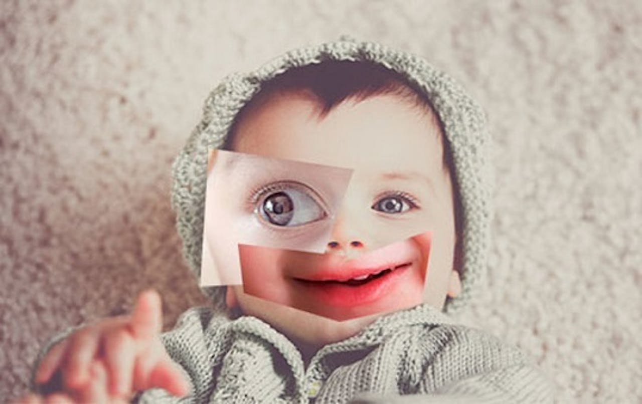 Afbeelding van een baby met twee duidelijk verschillende ogen. Het is een beeld uit de campagne 'Perfect gemaakt' over het aanpassen van ons eigen DNA.