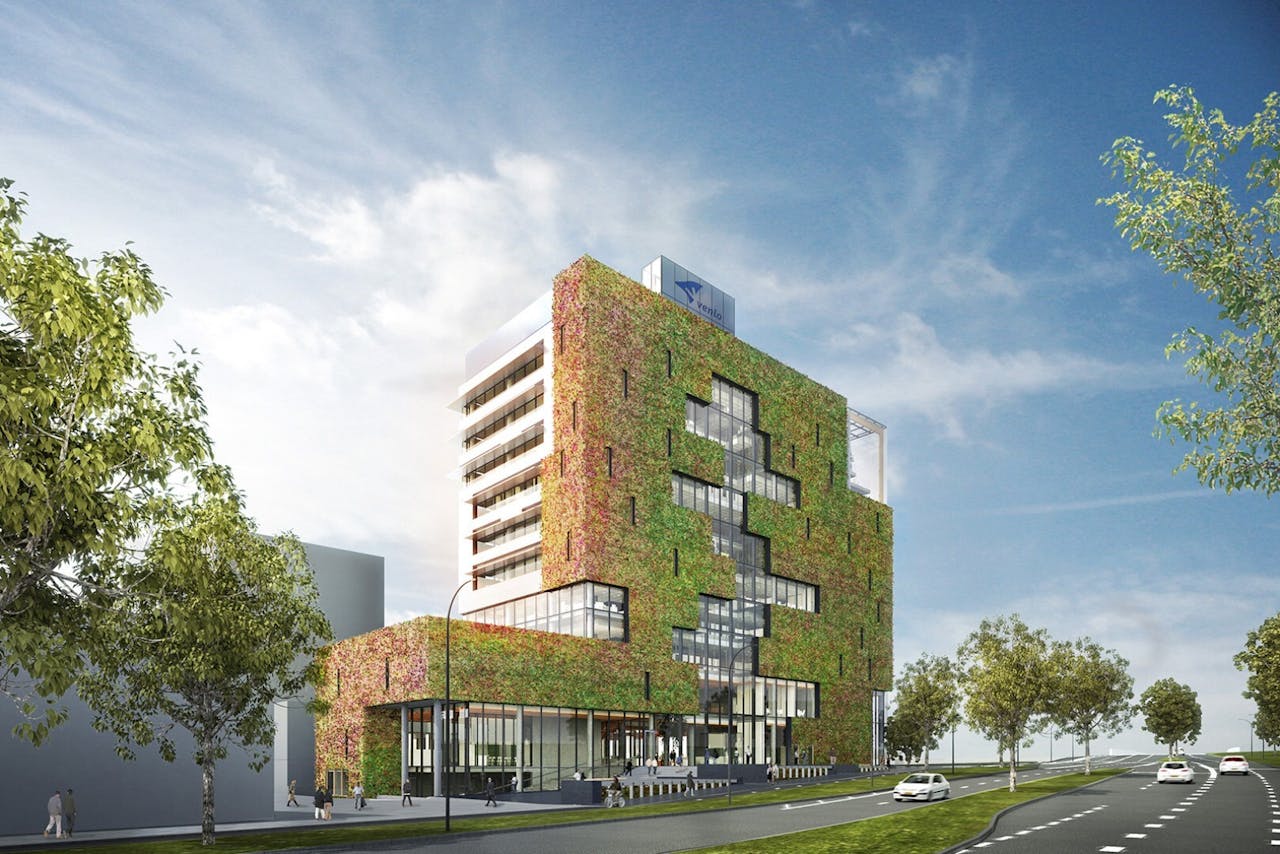 De groene gevel van het gebouw die lucht zuivert.