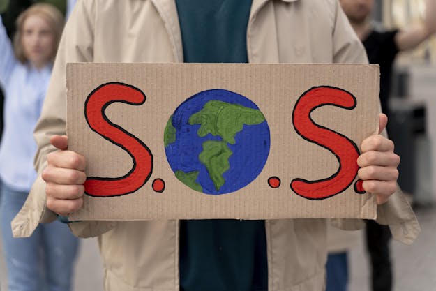 Bord S.O.S. voor klimaatverandering Bord S.O.S. voor klimaatverandering